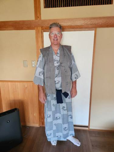 A person in a robe

AI-generated content may be incorrect.