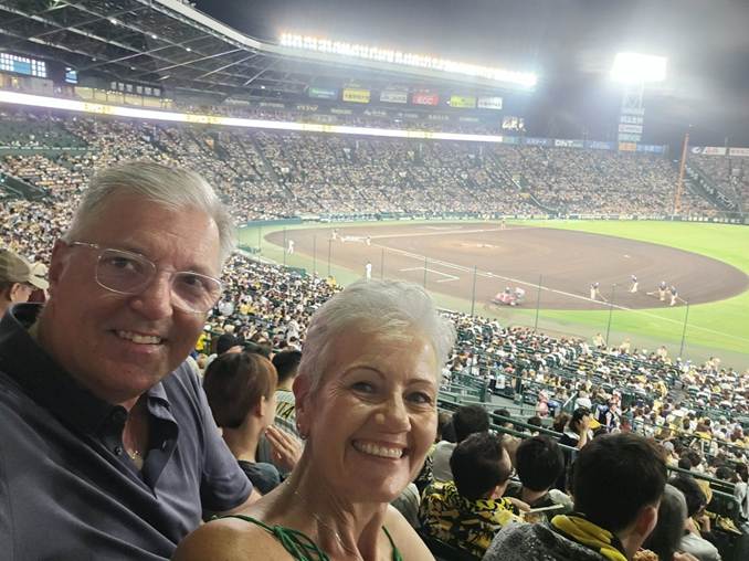 A person and person taking a selfie in a stadium

AI-generated content may be incorrect.