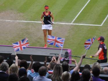 A player acknowledging the crowd with Union flags waving
