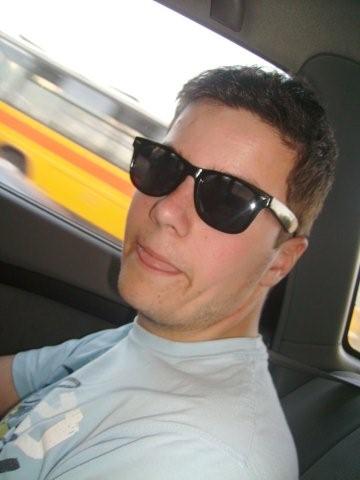 Anthony in sunglasses in the car