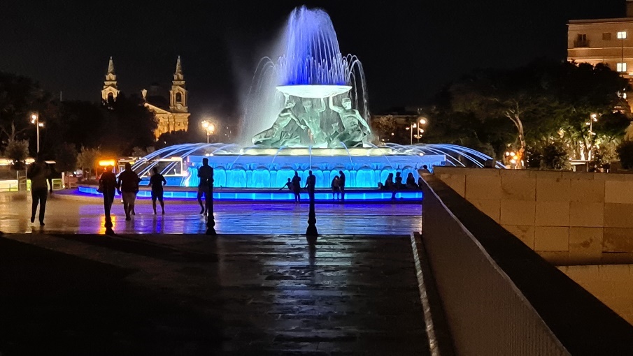 The restored fountain in Valletta lit up at night