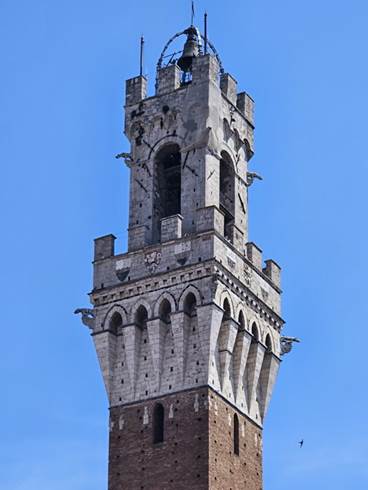 A picture containing building, tower, sky, outdoor

Description automatically generated