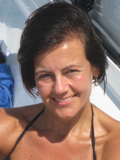 Caroline sitting on the catamaran