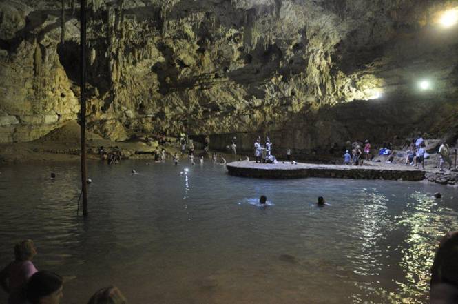Swimming in a cenote cave lake