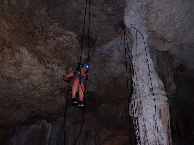 Abseiling into the sinkhole at Rio Secreto