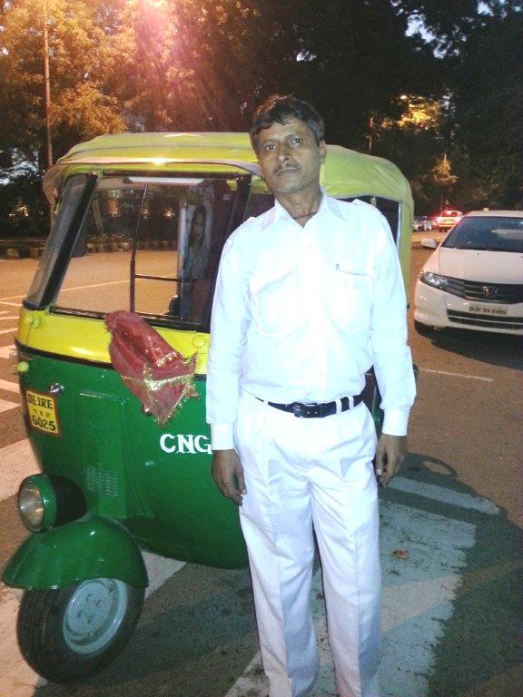 Nanek the tuk-tuk driver, parked on a zebra crossing