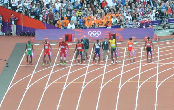 Sprinters at the start line before the 100m final
