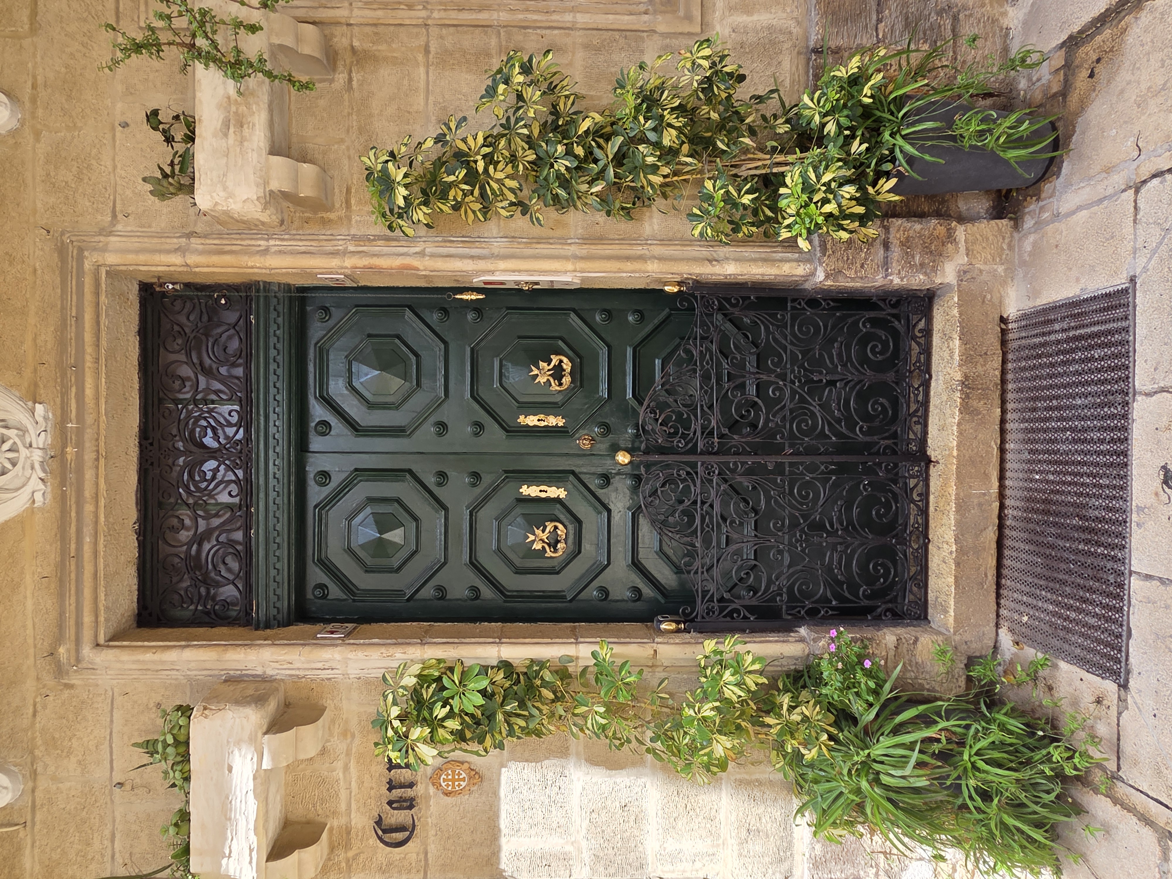 Ornate dark green door