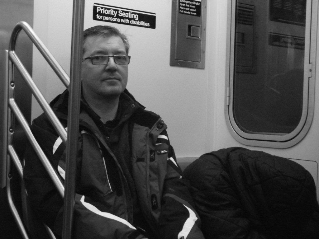 Black and white photo on the New York subway