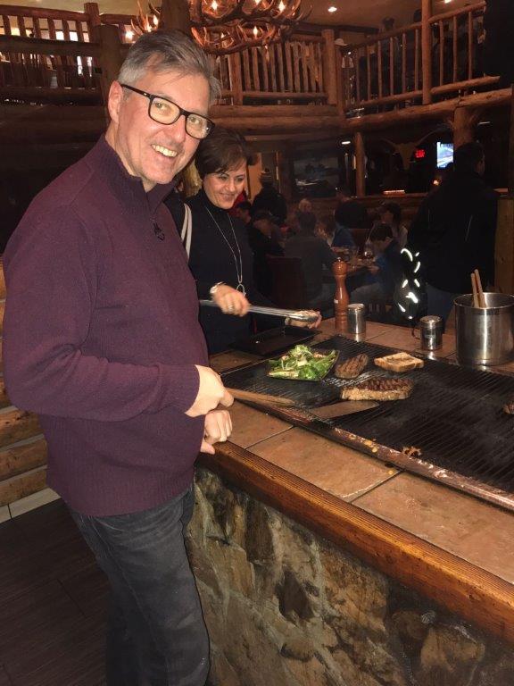 Cooking steak at the 8th Street Steakhouse