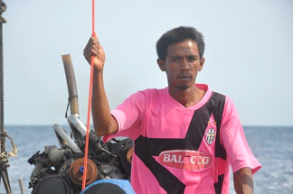 The boat skipper, who didn't say a word all day